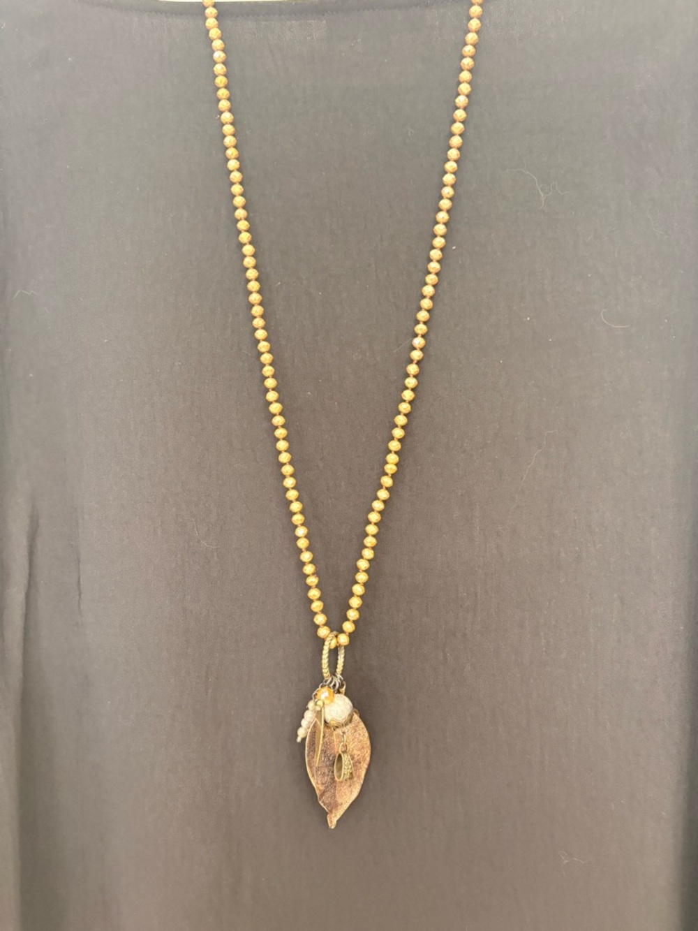 Lost and Found Handcrafted Gold Bead Necklace with Leaf Pendant